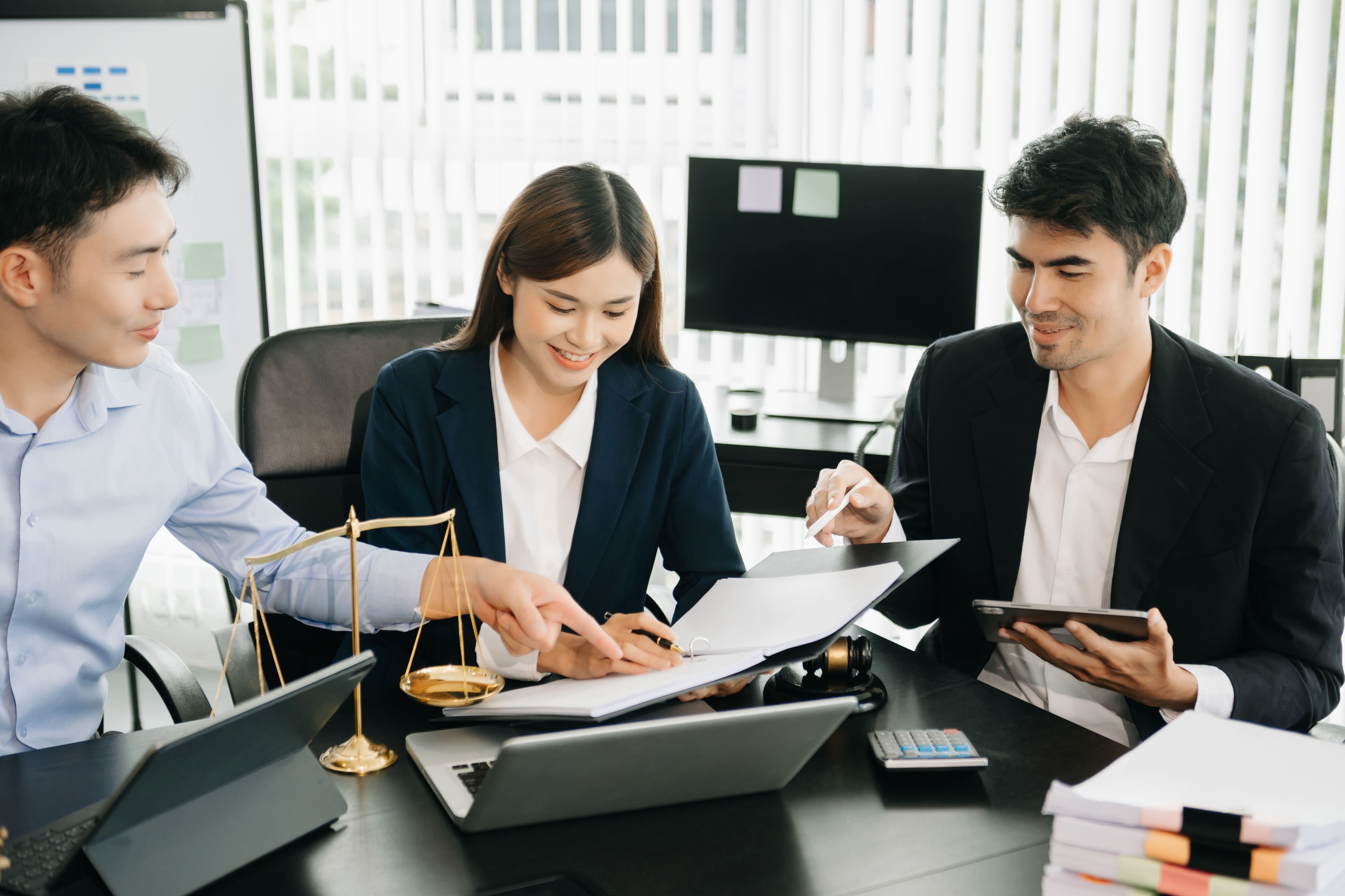 BRCR Global team reviewing compliance reports
